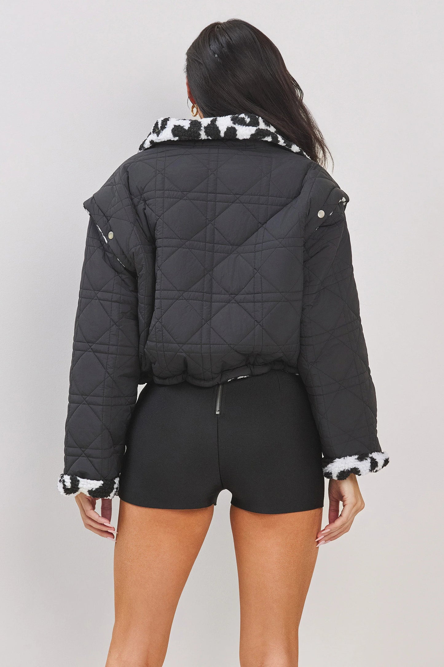 QUILTED REVERSIBLE FAUX FUR JACKET AND DETACHABLE SLEEVE